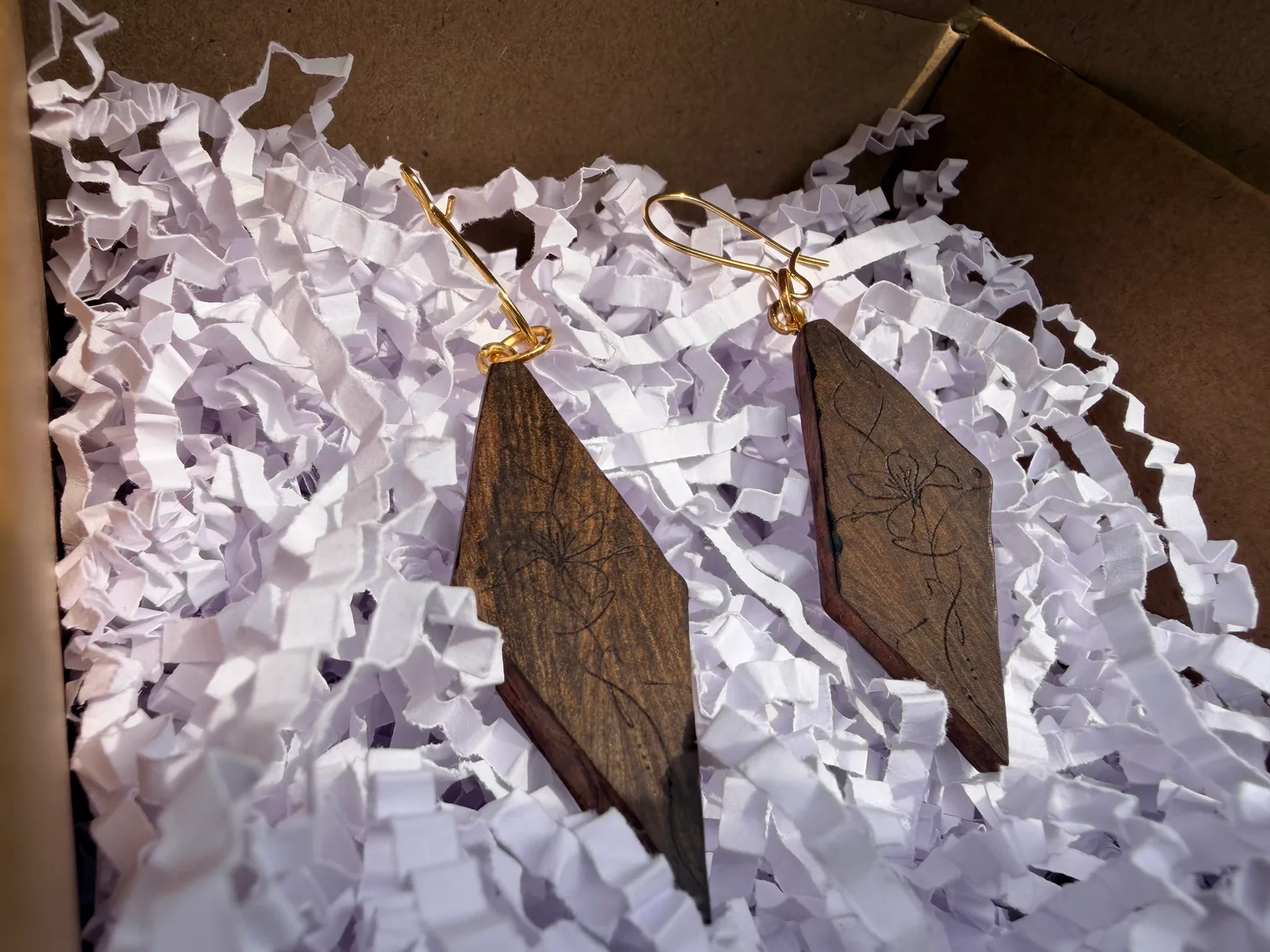 “Asymmetrical Diamond” earrings. 2
